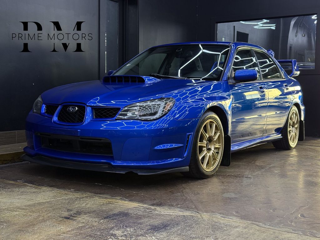 2006 Subaru Impreza WRX STI- GOLD WHEELS's photo